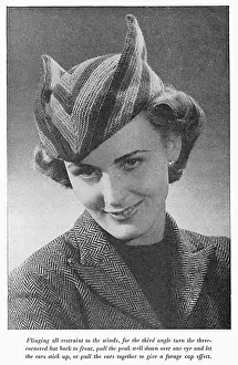 Stripey: Three cornered knitted hat, circa 1941
