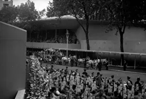 Terence: Coronation The empty coach passes the Abbey