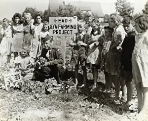 Erding: A Corporal with German Children Growing Vegetables at th?