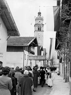 Almsgiving: Corpus Christi procession in Tyrol. About 1960