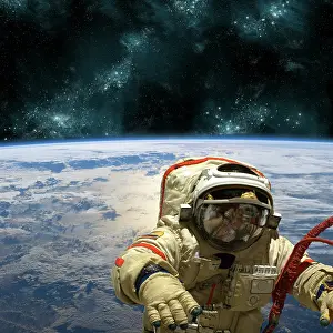 Weightless: A cosmonaut floats in space above Earth