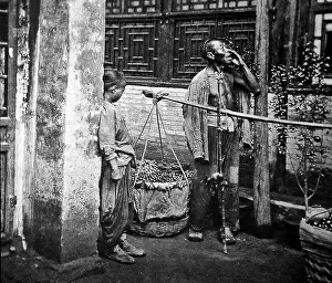 Informing: Costermonger carrying wares, China