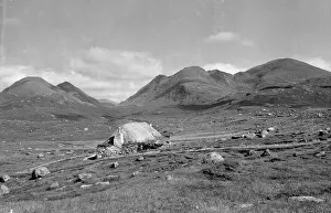 Crofter: Cottage in a bleak Scottish landscape