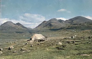 Crofter: Cottage in a bleak Scottish landscape