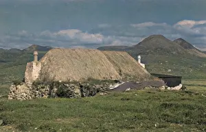 Cottages in a bleak Scottish landscape