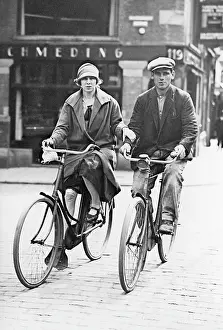 Tights: Couple on bikes, 1924