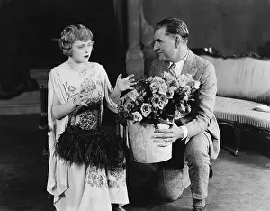 Tokens: Couple with bouquet of roses