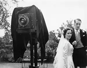 Wetherby: Couple and camera at wedding reception, Wetherby, Yorkshire