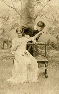 Canoodling: Couple canoodling on a bench