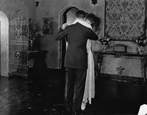 Tenderness: Couple dancing at home