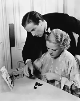 Diversion: Couple doing puzzle
