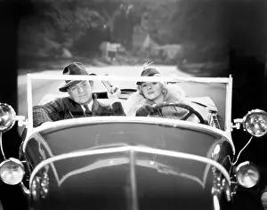Carefree: Couple driving a car