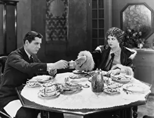 Friction: Couple eating a meal together