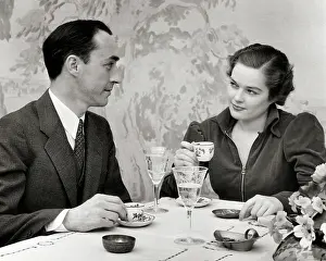 Espresso: Couple, Elegant Dining Table, Crystal Goblets Demitasse Cups
