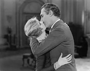 Intimacies: Couple embraced and kissing each other