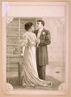 C1909: Couple embracing in library