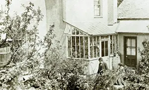 The Annabel Watts Collection: Couple enjoying the sunshine in their back garden