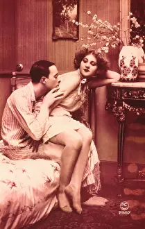 Couple in erotic bedroom scene