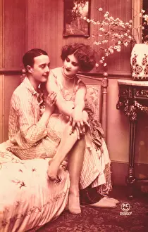 Couple in erotic bedroom scene
