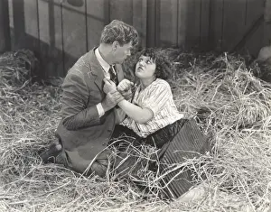 Wrists: Couple fighting in barn