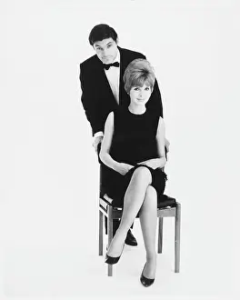 Behing: COUPLE IN FORMAL DRESS