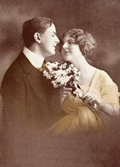 A couple gaze longingly at each other