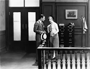 Argue: Couple having argument in office