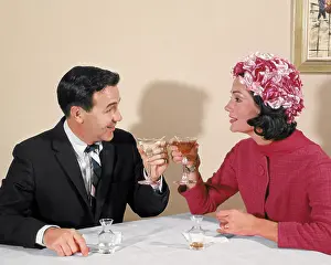 Classic Stock: Couple Having Drinks Toasting Restaurant Table