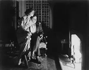 Cozy: Couple having a fireside chat