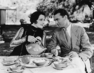 Teatime: Couple having tea outdoors
