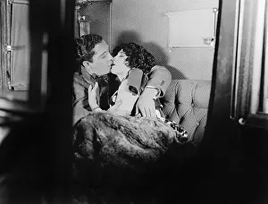 Coquettish: Couple kissing each other
