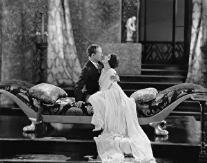 Opulence: Couple kissing indoors