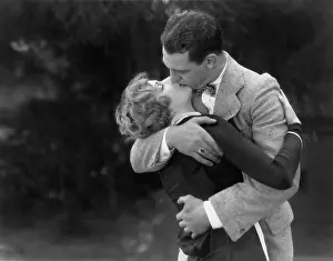 Desirable: Couple kissing passionately
