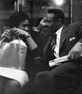 Clapham: Couple on a London underground train