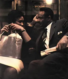Clapham: Couple on a London underground train