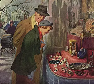 Sweethearts: Couple looking at Engagement Rings