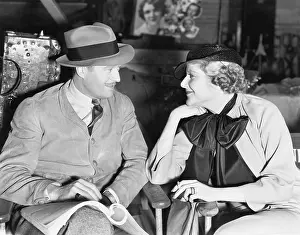 Mustaches: Couple looking at each other flirting and smiling