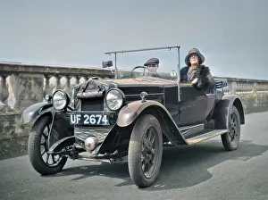 Headlamps: Couple in an open-topped car