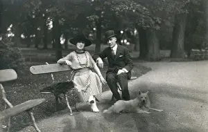 Pleated: Couple in a park with a dog, France