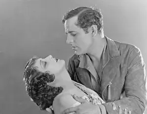 Intimacies: Couple passionately embracing