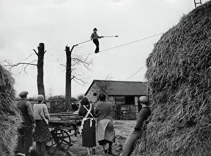 Fascination: A couple of people watching a tightrope