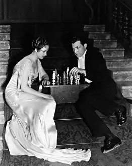 Strategies: Couple playing chess