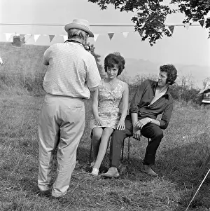 Midground: Couple Posing For Photo