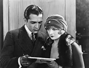 Startling: Couple reading document together