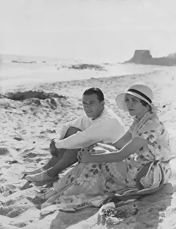Getaway: Couple relaxes at the beach