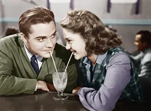 Straws: Couple in a restaurant looking at each other and