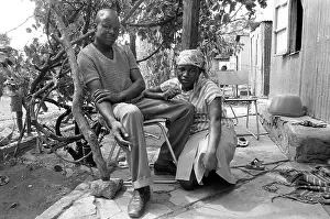 Brits: Couple in the shade of an Oukasie home. The people