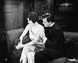 Affections: Couple sitting together on a couch