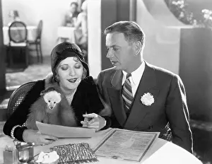 Infatuated: A couple sitting together at a dinner table