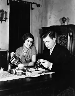 Foodstuff: Couple sitting together having tea